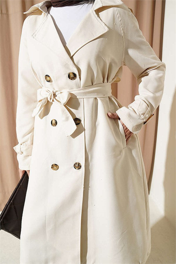Double-breasted trench coat with epaulets