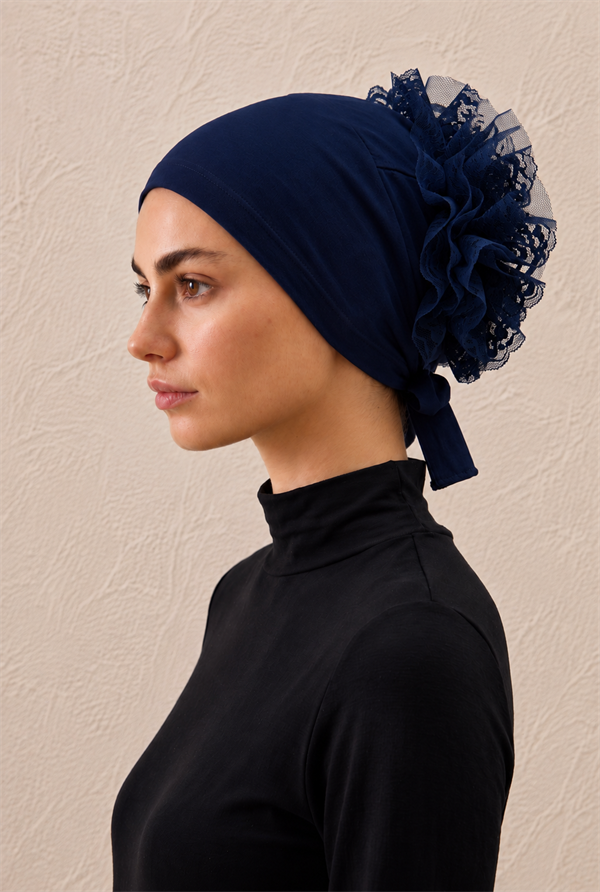 Navy Blue Hairstyle with Ruffled Back Bun
