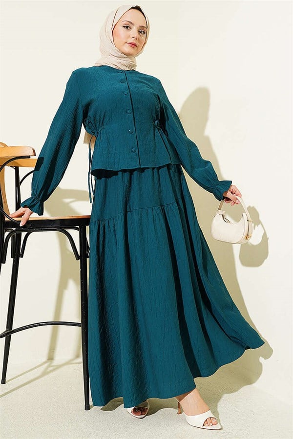 2 Piece Set with drawstring waist and skirt, in petrol color.