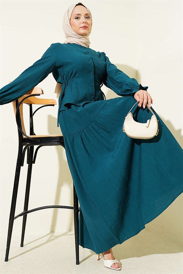 2 Piece Set with drawstring waist and skirt, in petrol color.