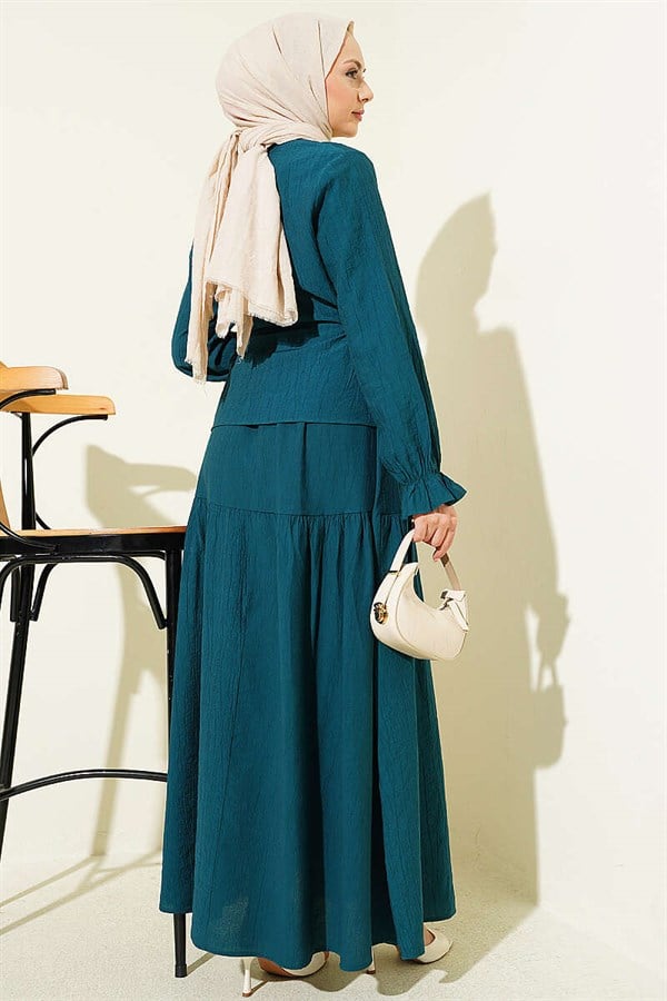 2 Piece Set with drawstring waist and skirt, in petrol color.
