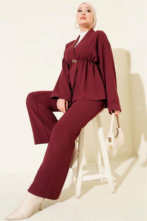 2 Piece Set in burgundy with elasticated waist and gold accessories.