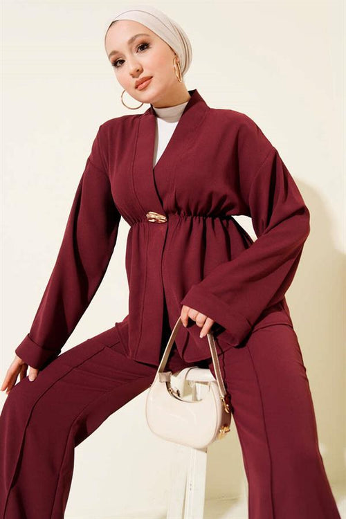 2 Piece Set in burgundy with elasticated waist and gold accessories.