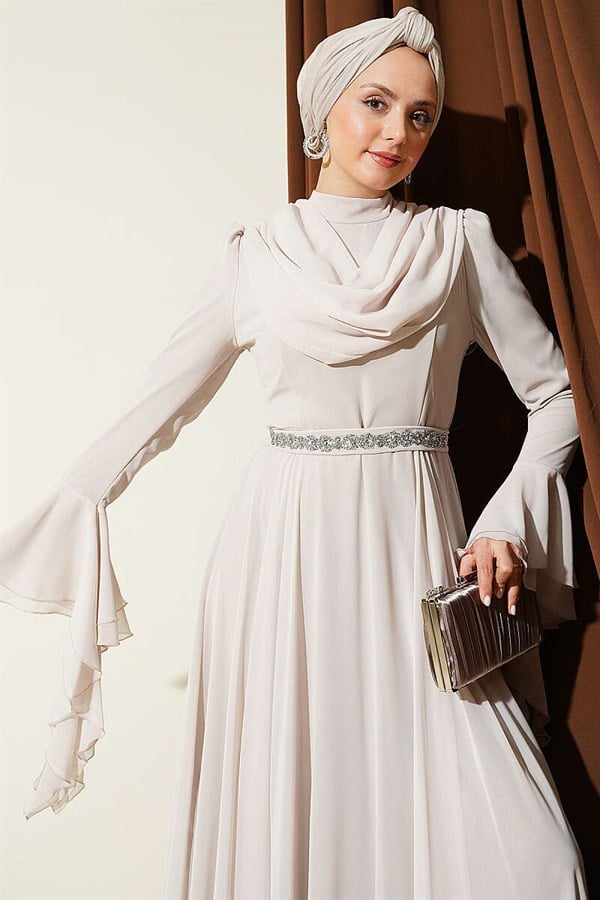 Waist-embellished, V-neck chiffon evening dress with rhinestones.