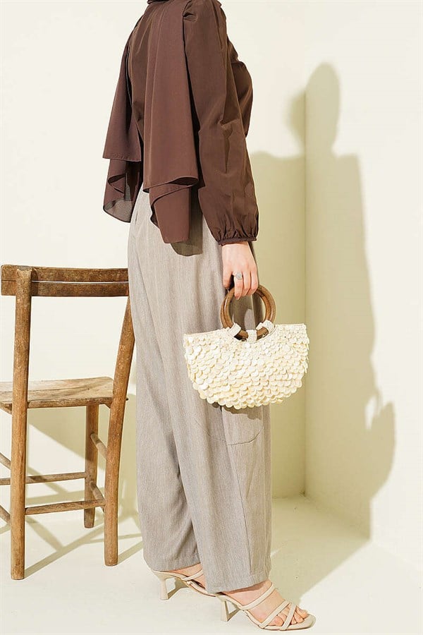 Button-waist pleated harem pants, beige.