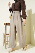 Button-waist pleated harem pants, beige.