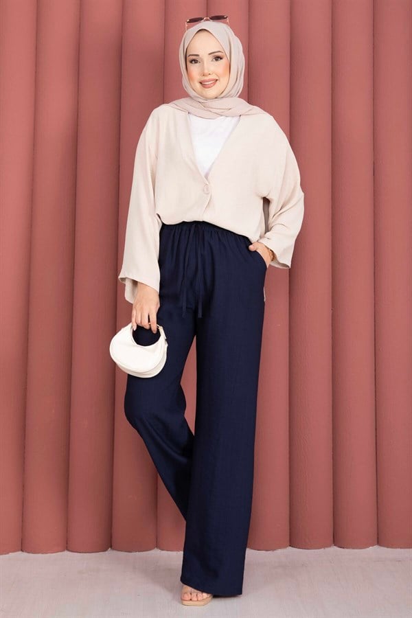 Wide-leg trousers with elasticated waist, navy blue.