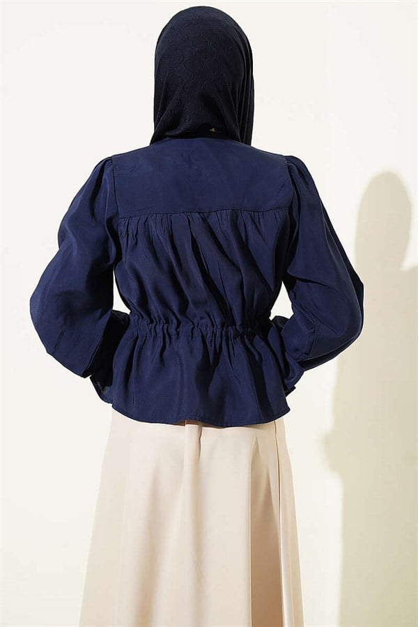 Loose-fitting short shirt with tunnel waist, navy blue.