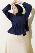 Loose-fitting short shirt with tunnel waist, navy blue.