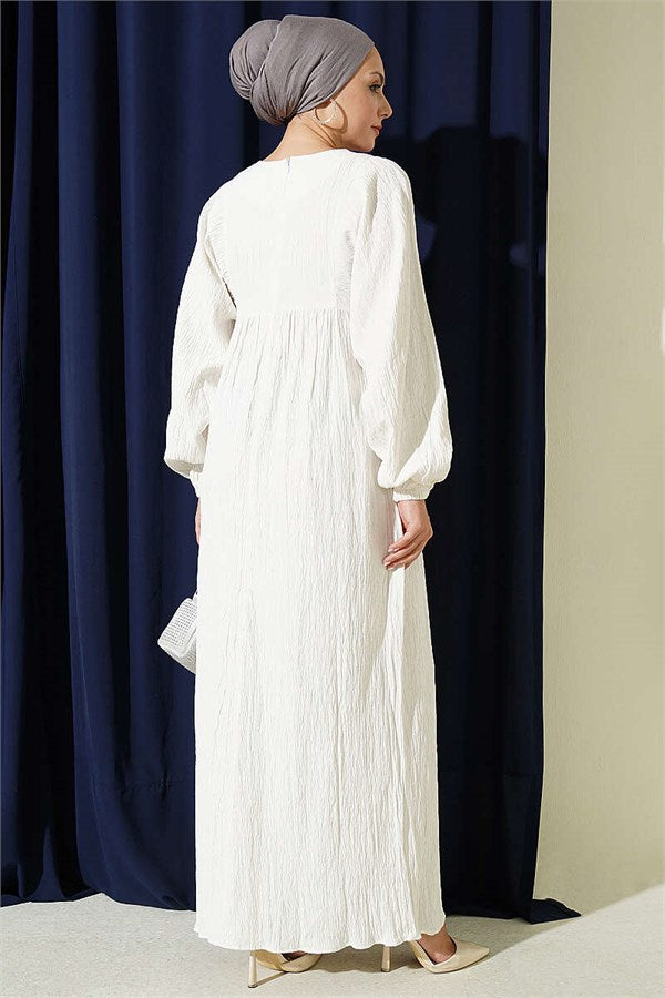 Loose-fitting dress with elasticated ankles, ecru.