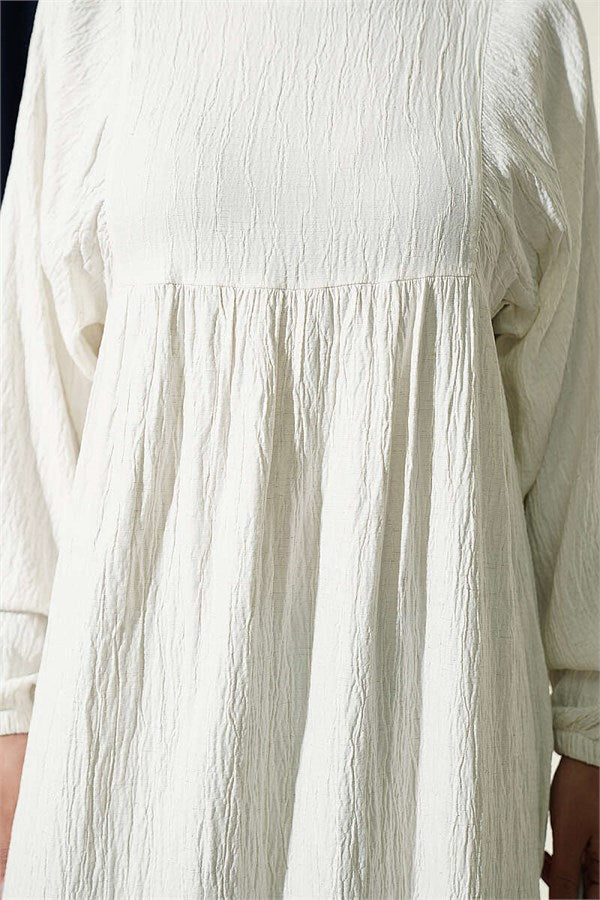 Loose-fitting dress with elasticated ankles, ecru.