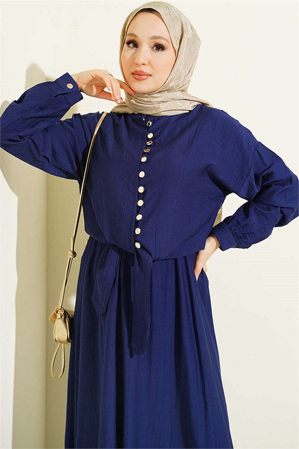 Button-down, front-tie skirt two-piece set in navy blue.