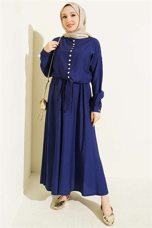 Button-down, front-tie skirt two-piece set in navy blue.