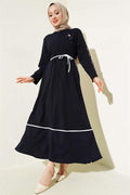 Navy Blue Dress with Floral Accessory and Piping Detail