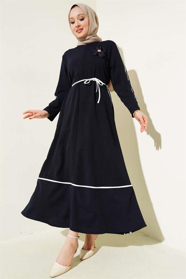 Navy Blue Dress with Floral Accessory and Piping Detail