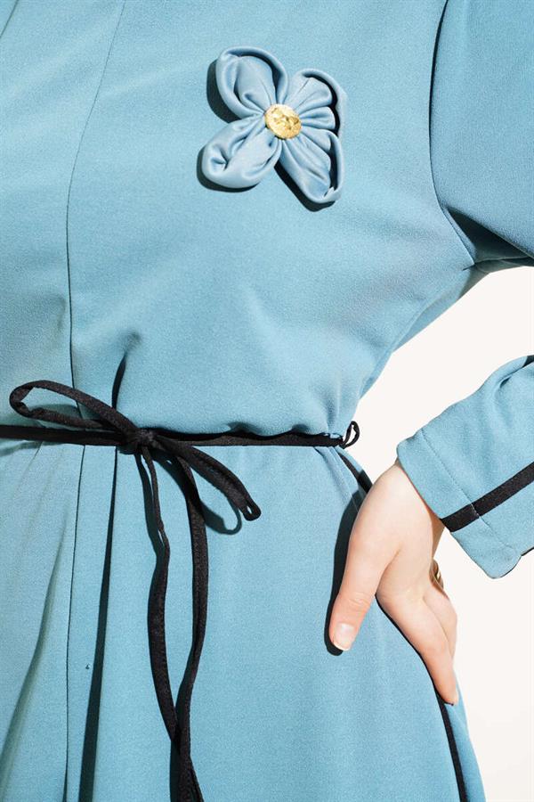 Blue Dress with Floral Accessory and Piping Detail