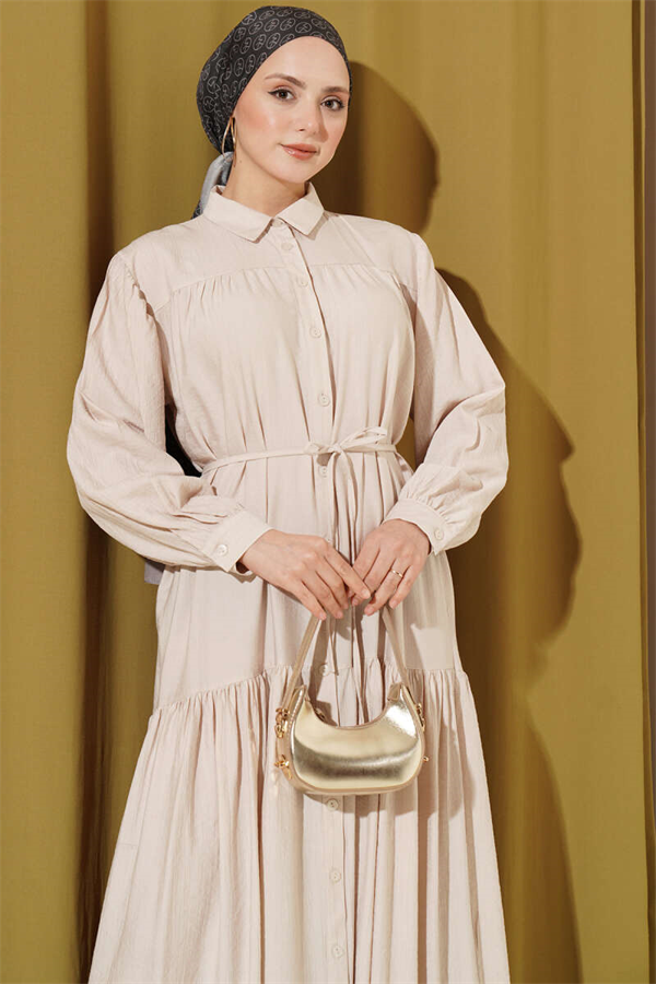 Button-down, lace-up dress in beige.