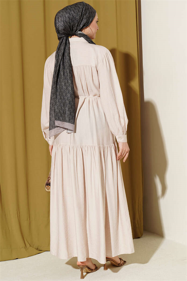 Button-down, lace-up dress in beige.