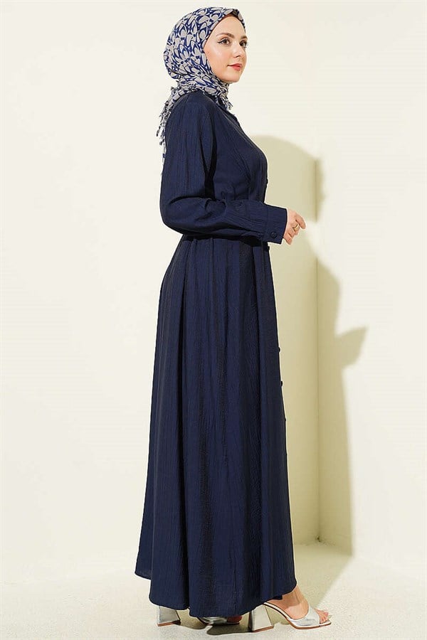 Full-length button-down dress with darts and belt, navy blue.