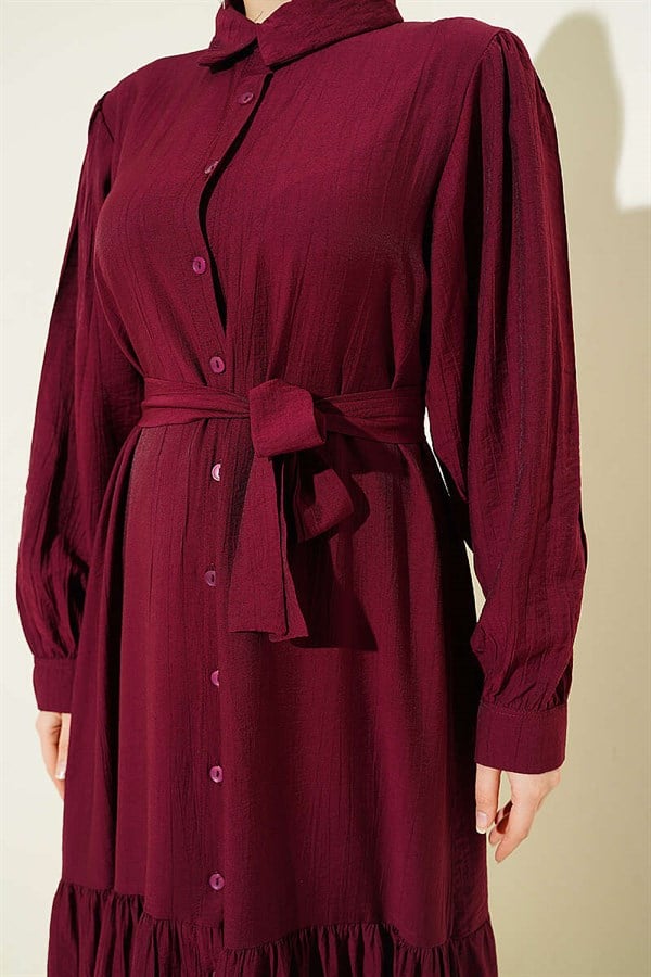Button-down, ruffled, belted dress in burgundy.