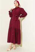 Button-down, ruffled, belted dress in burgundy.