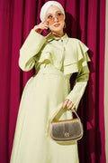 Double-collared dress with gold buttons and belt, mint green.