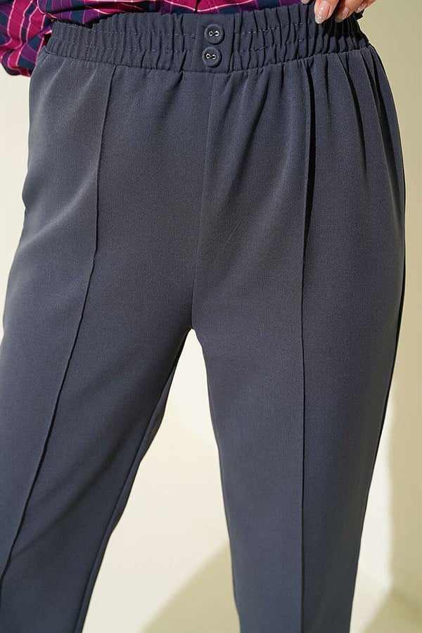 Slim-fit, elasticated waistband trousers, charcoal gray.