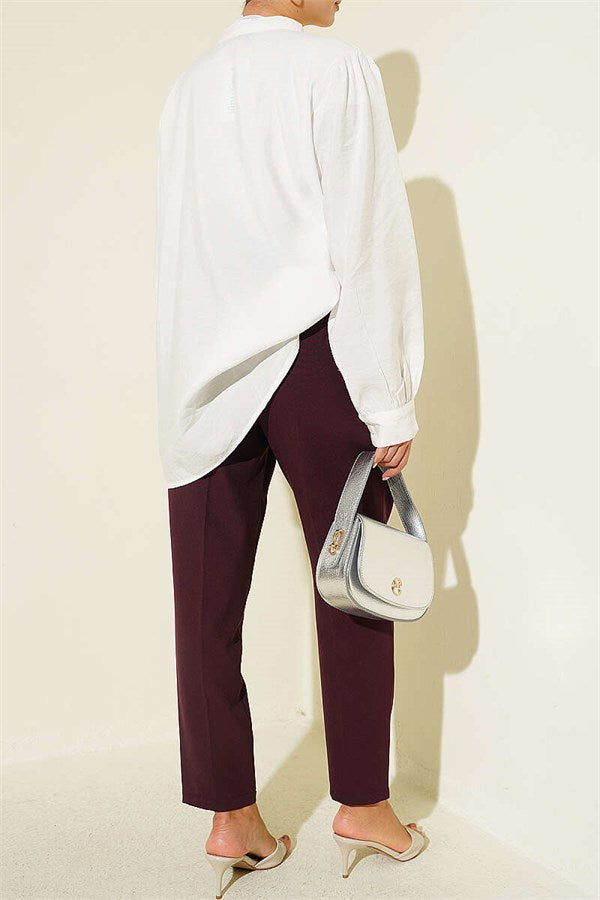 Slim-fit, darted, belted fabric trousers, plum color.