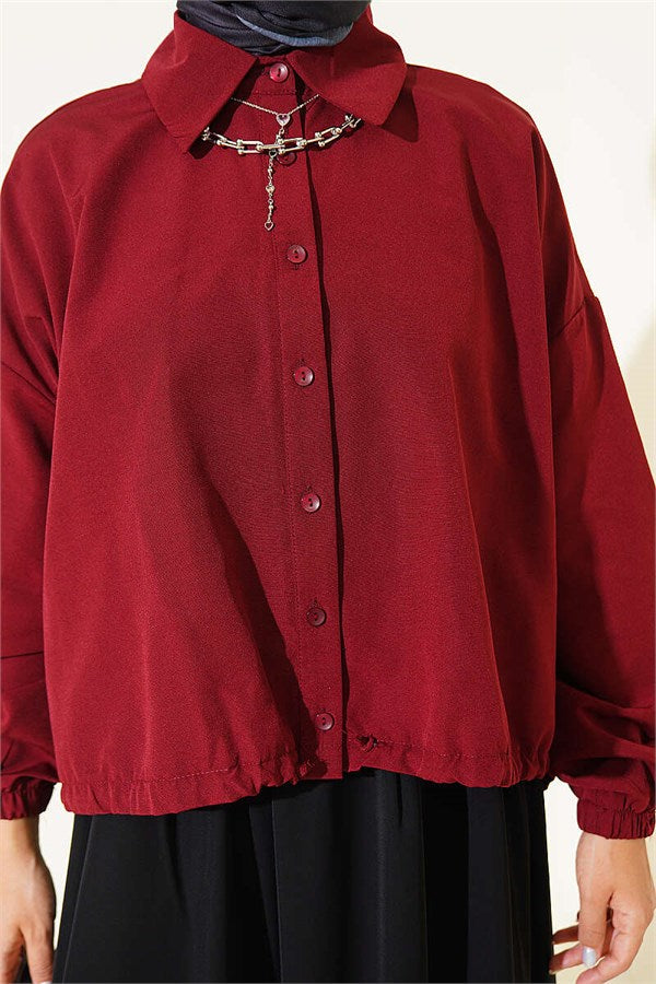 Loose-fitting shirt with tunnel hem, burgundy.