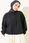 Loose-fitting shirt with tunnel hem, black.