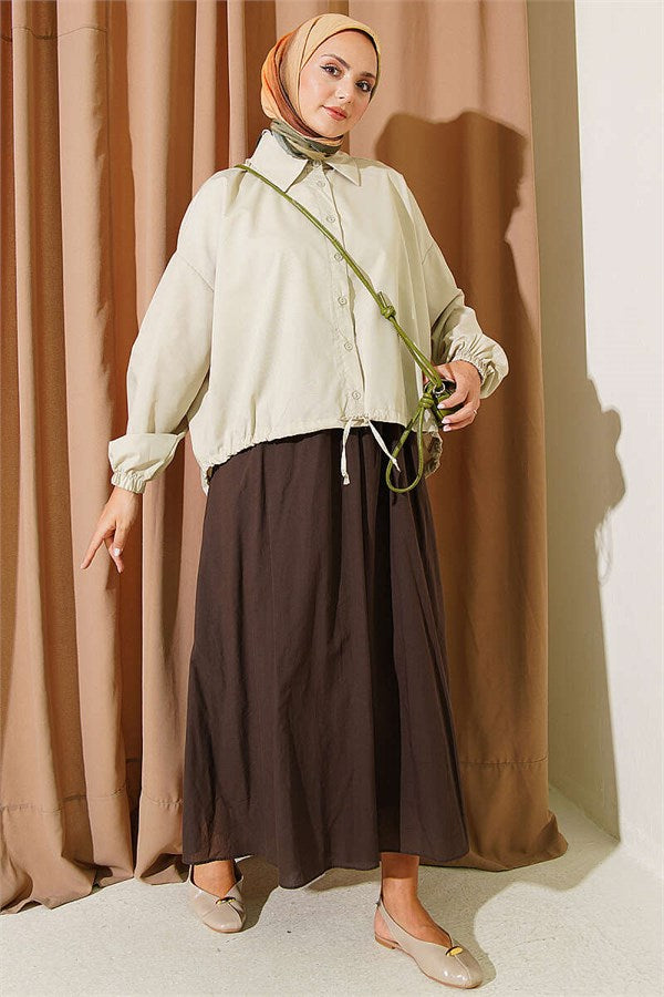 Loose-fitting shirt with tunnel hem, aqua green.