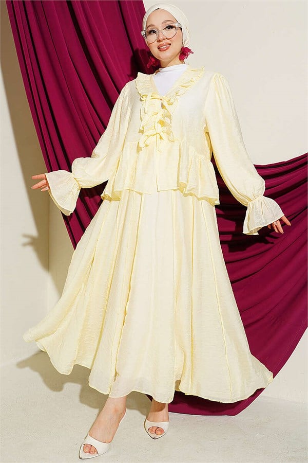Two-piece set with ruffle detail and tie-up skirt, yellow.