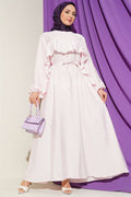 Pink Dress with Ruffle Trim and Strappy Belt