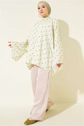 Loose-fitting tunic with wide sleeves and polka dot pattern, aqua green.