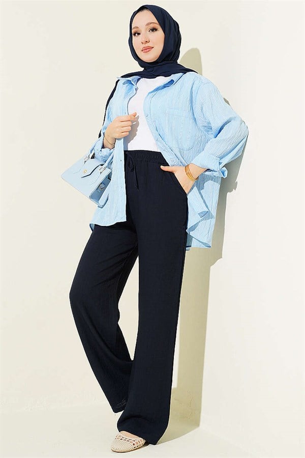 Wide-legged, elasticated waist trousers, navy blue.