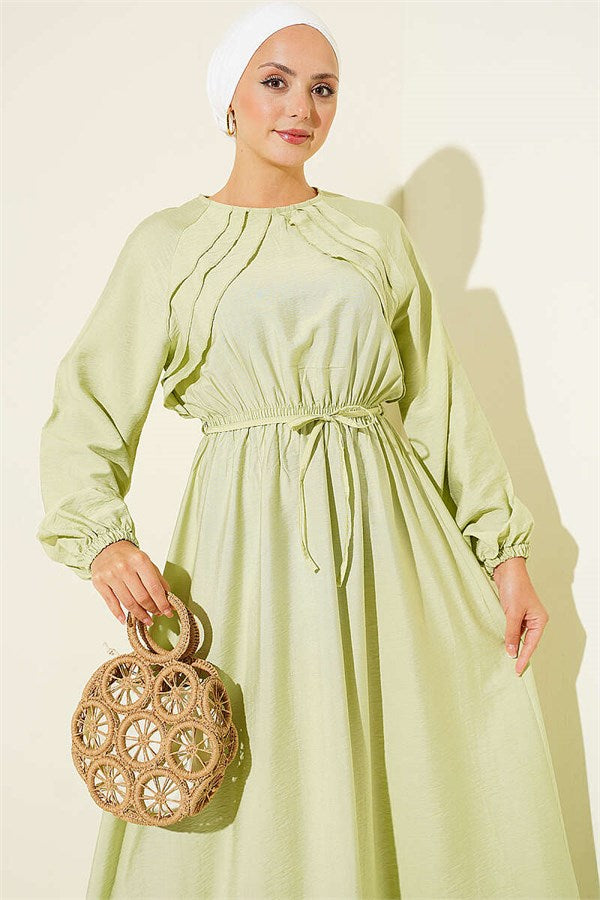 Light Green Dress with Ruffle Detail and Strappy Belt