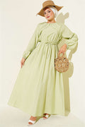 Light Green Dress with Ruffle Detail and Strappy Belt