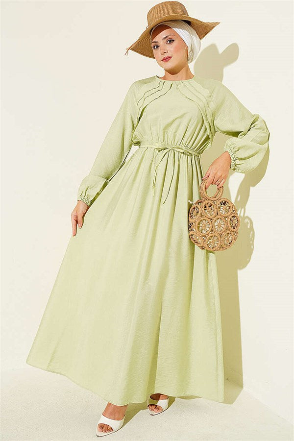 Light Green Dress with Ruffle Detail and Strappy Belt