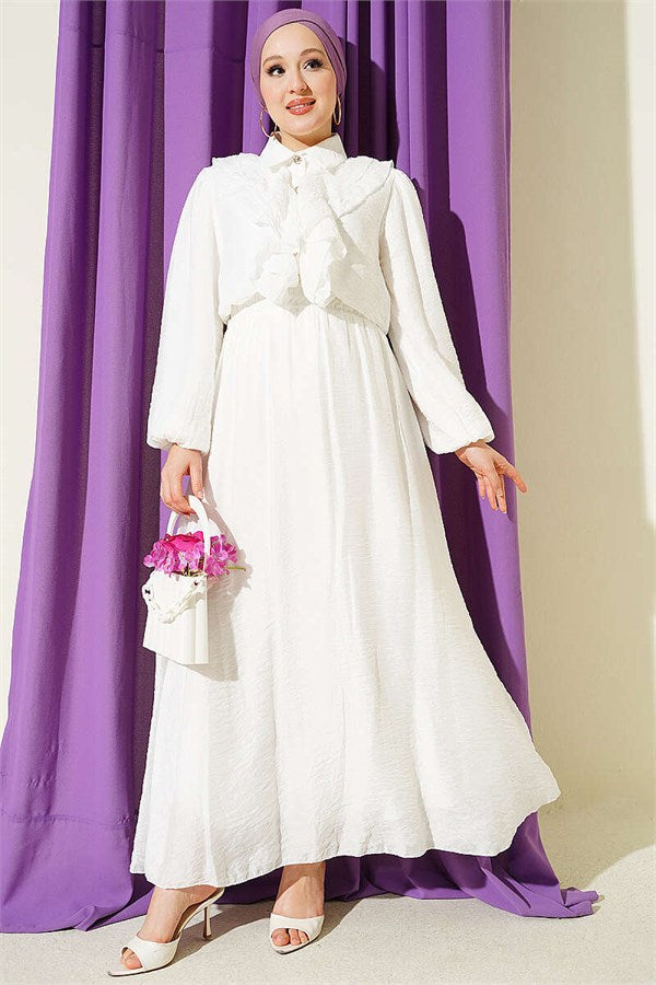 Two-piece set with ruffled skirt and gold button detail, ecru.
