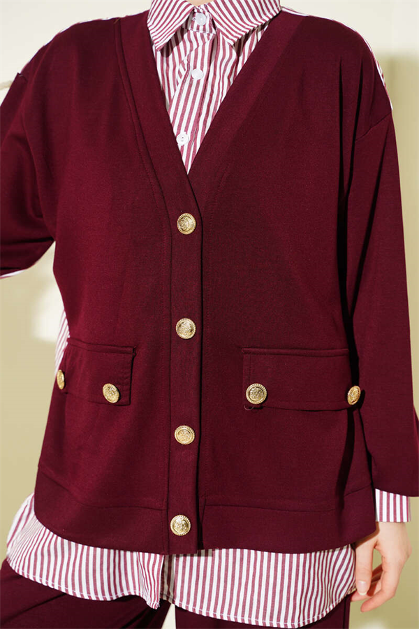 Loose-fitting 2 Piece Set with gold buttons and trim in burgundy.