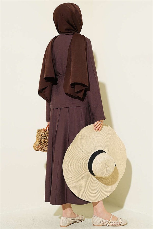2 Piece Set with gold buttoned belt and pleated skirt, dark brown.