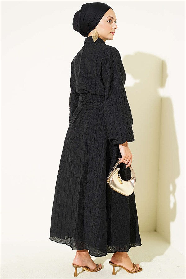 2 Piece Set with gold buttons and front-tie skirt, black.