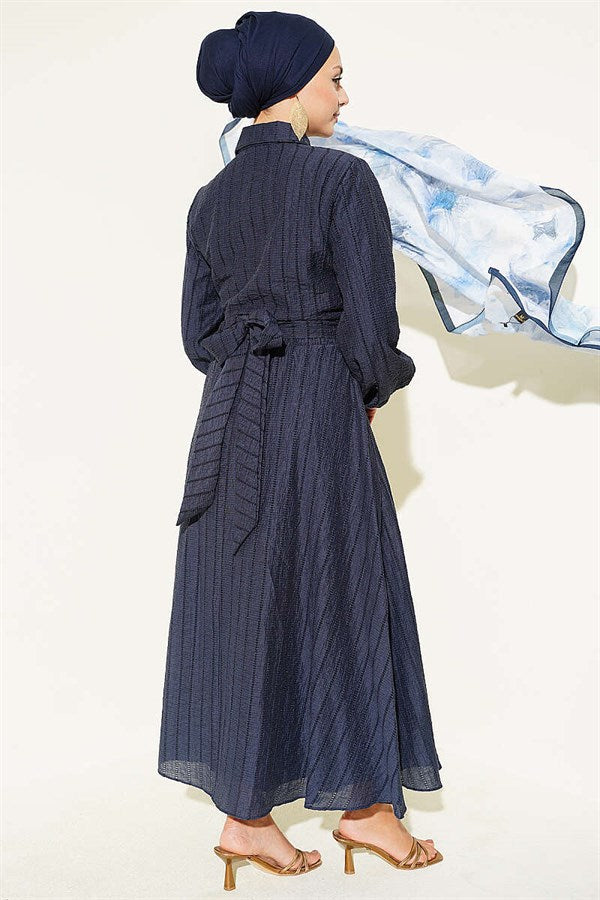 2 Piece Set with gold buttons and front-tie skirt, navy blue.