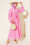 2 Piece Set with gold buttons and front-tie skirt, pink.