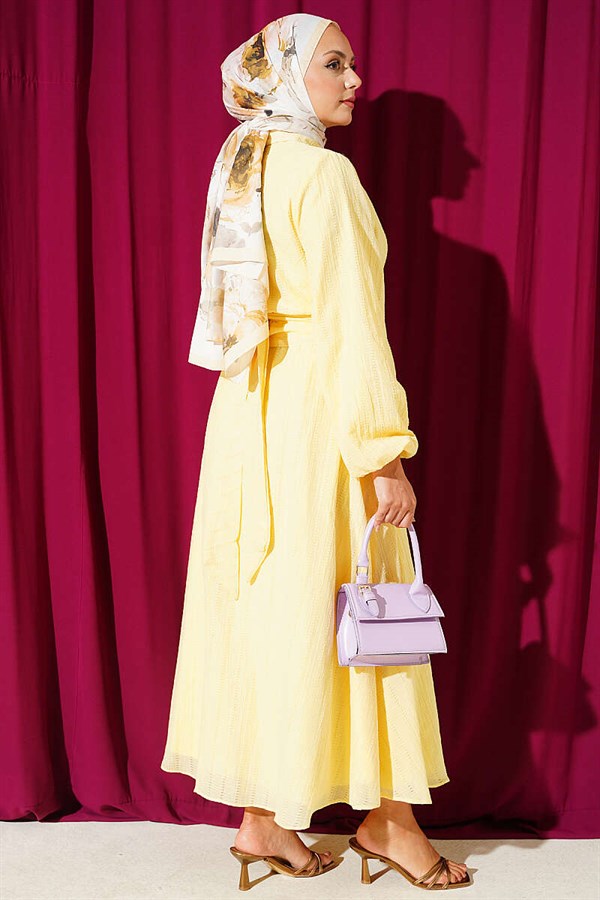 2 Piece Set with gold buttons and front-tie skirt, yellow.