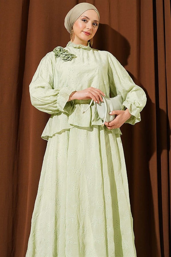 2 Piece Set with ruffled skirt and rose accessories, light green.