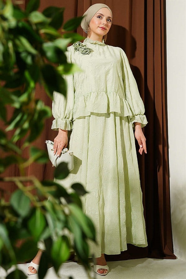 2 Piece Set with ruffled skirt and rose accessories, light green.