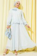 2 Piece Set with ruffled skirt and rose accessories, blue.