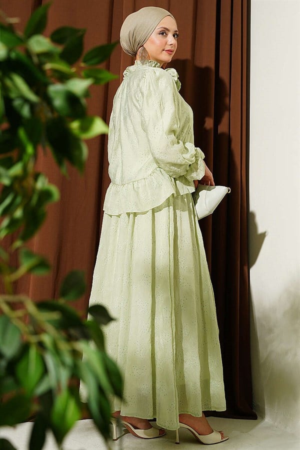 2 Piece Set with ruffled skirt and rose accessories, light green.