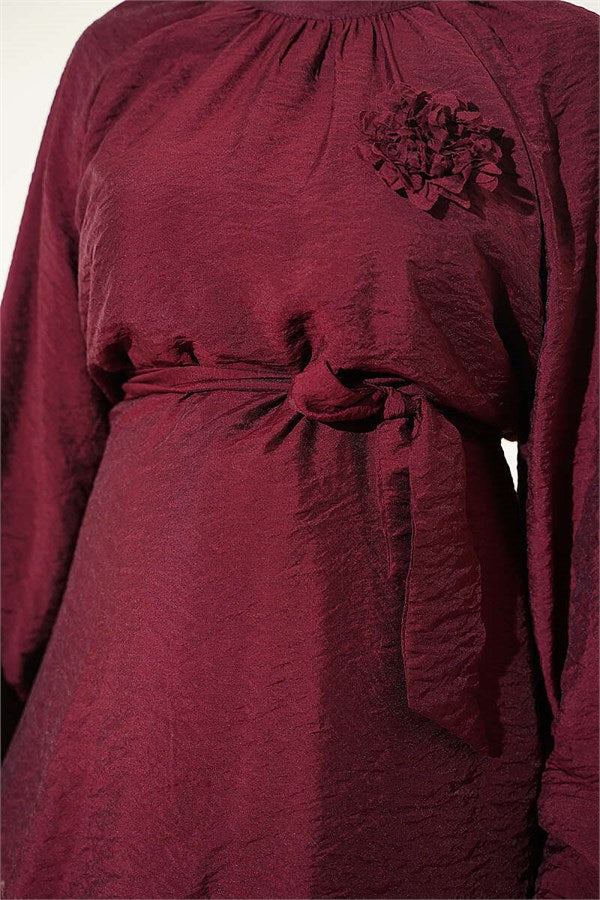 Burgundy Tunic with Rose Brooch and Belted Waist
